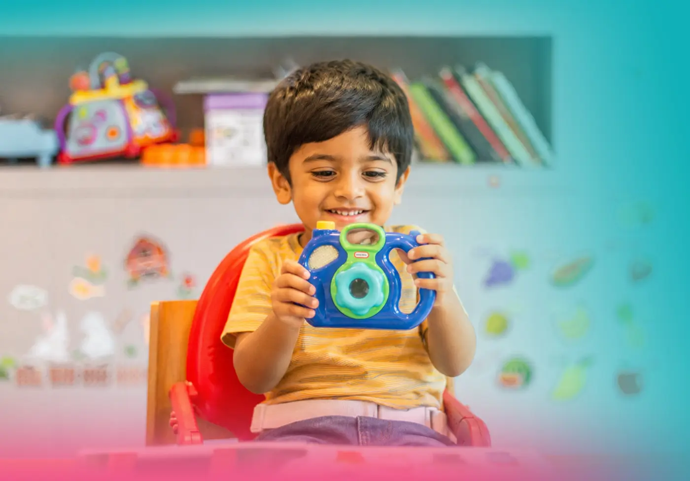 Young child exploring toys during playful classroom discovery